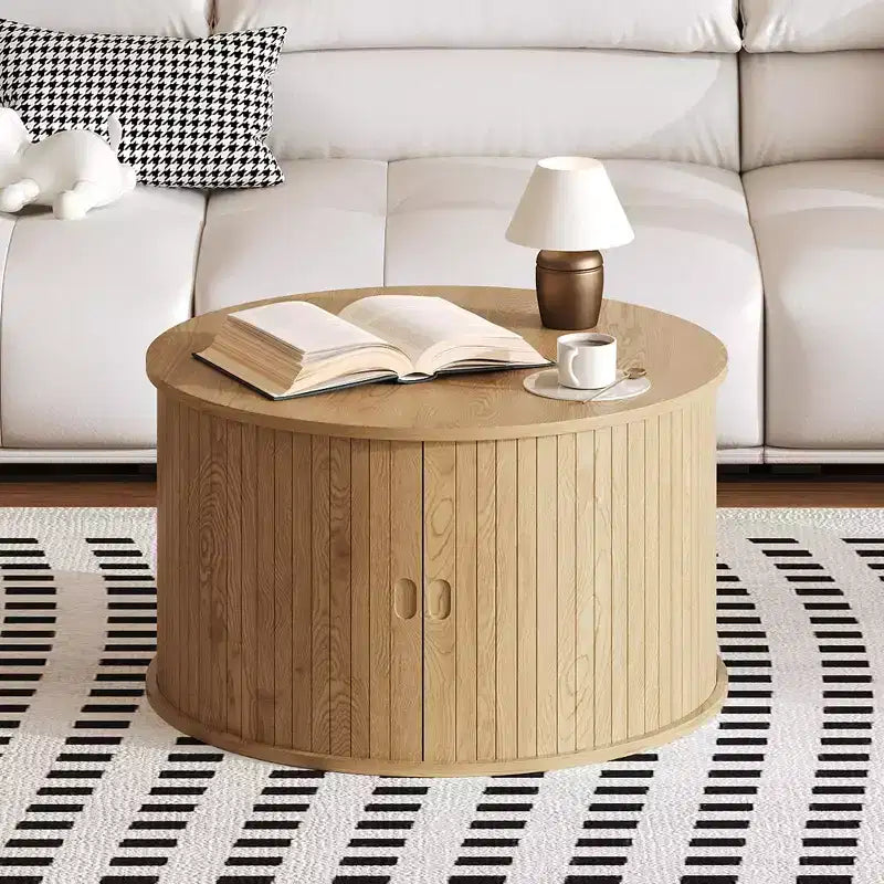 Tavolino da caffè rotondo con contenitore, tavolino da caffè con pannelli scanalati, anta scorrevole curva e ripiano a vista, tavolino moderno in legno